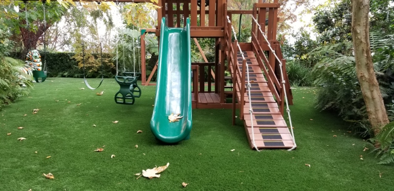 Playground with artificial turf.
